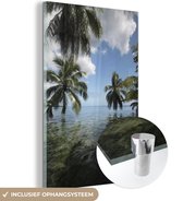 MuchoWow® Glasschilderij 80x120 cm - Schilderij acrylglas - Palmbomen op een strand in Moorea in Oceanië - Foto op glas - Schilderijen