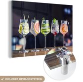 MuchoWow® Glasschilderij 120x80 cm - Schilderij acrylglas - Cocktail - Wijnglas - Restaurant - Zomer - Foto op glas - Schilderijen