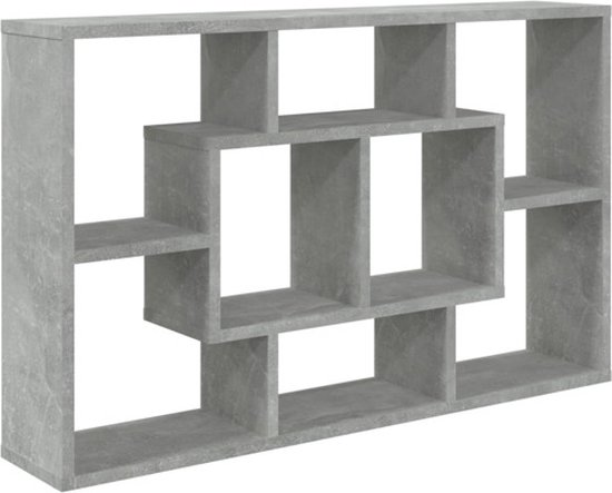 Betongrijze wandkast met een geometrisch patroon van open vakken.