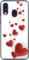 Geschikt voor Samsung Galaxy A40 hoesje - Een illustratie van een pad van hartjes - Siliconen Telefoonhoesje