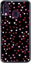 Geschikt voor Samsung Galaxy A40 hoesje - Een illustratie met hartjes op een zwarte achtergrond - Siliconen Telefoonhoesje