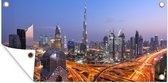 Tuinposter De vele neonlichten van Dubai met als middelpunt de Burj Khalifa - 80x40 cm - Wanddecoratie Buiten - Tuinposter - Tuindoek - Schuttingposter - Tuinschilderij