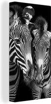 Canvas Schilderij Dierenprofiel zebra's in zwart-wit - 20x40 cm - Wanddecoratie