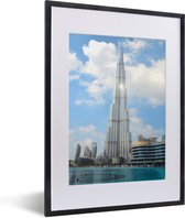 Fotolijst incl. Poster - De zon schijnt op de Burj Khalifa in Dubai - 30x40 cm - Posterlijst