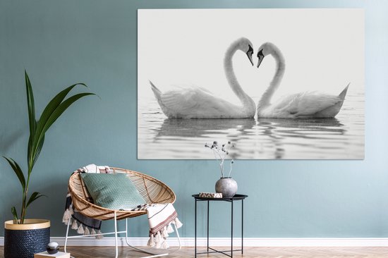 Canvas schilderij 150x100 cm - Wanddecoratie Twee zwanen die samen een hart vormen - zwart wit - Muurdecoratie woonkamer - Slaapkamer decoratie - Kamer accessoires - Schilderijen