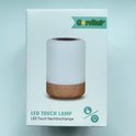 Emballage d'une 'Lampe Tactile LED' avec une base imitation bois et une partie supérieure blanche lumineuse.