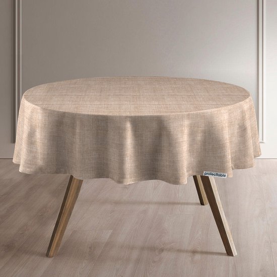 Nappe ronde aspect lin, couleur beige, sur une table en bois.