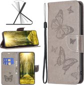 Mobigear Telefoonhoesje geschikt voor Nokia G11 Hoesje | Mobigear Butterfly Bookcase Portemonnee | Pasjeshouder voor 2 Pasjes | Telefoonhoesje voor Pinpas / OV Kaart / Rijbewijs - Grijs