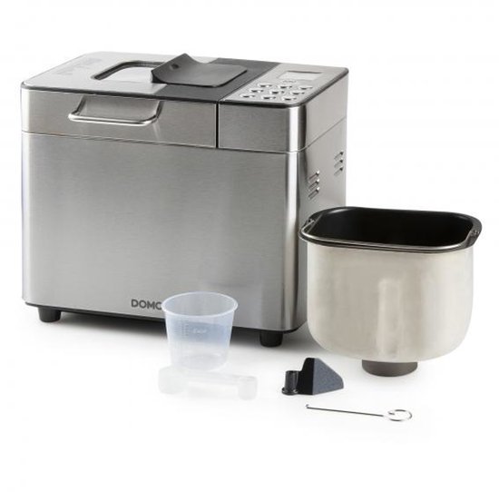 RVS broodbakmachine met accessoires: bakvorm, maatbeker en deegkneder.