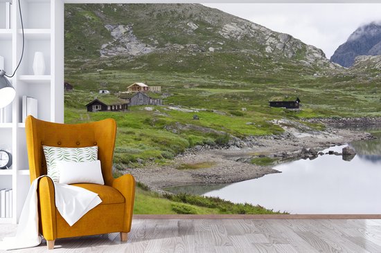 Chalets près d'un lac en Norvège fotobehang
