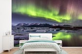 Behang - Fotobehang Aurora Borealis in IJsland - Breedte 450 cm x hoogte 300 cm