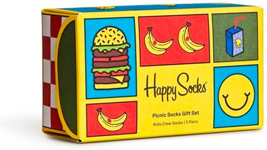 Gele cadeauverpakking voor sokken met hapjes en een lachende smiley.