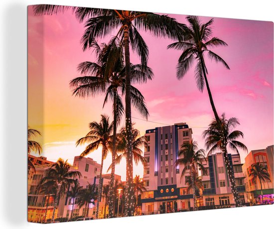 Canvas Schilderij South Beach met palmbomen en een gekleurde lucht - 90x60 cm - Wanddecoratie