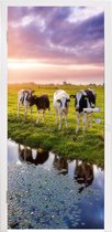 Deursticker Koeien tijdens een zonsondergang - 90x215 cm - Deurposter