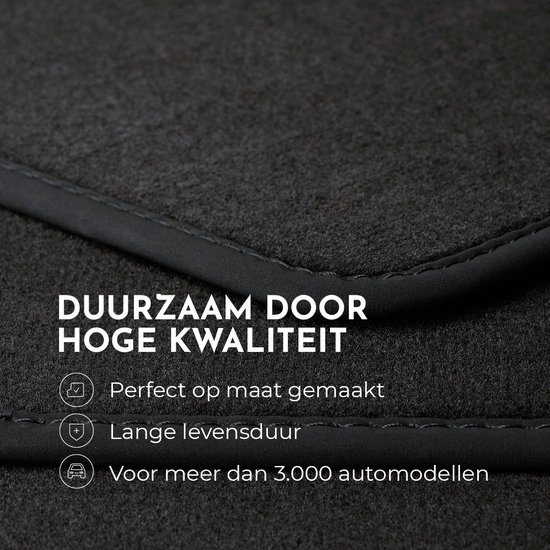 Tapis de sol de voiture noir avec passepoil gris, texte 'DURABLE GRÂCE À UNE HAUTE QUALITÉ'.