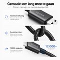 Hub USB Sounix noir avec connexions USB 3.0 et USB 2.0, à côté d'un MacBook et d'une carte SD.