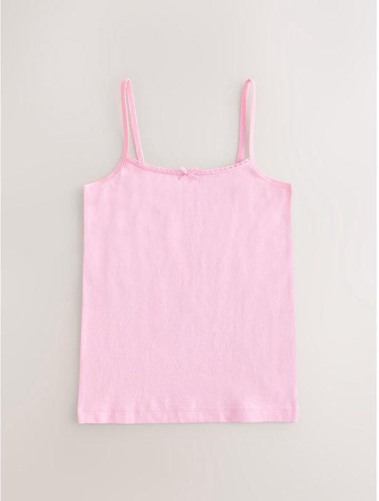 Roze hemd met smalle bandjes en een strikje op de borst.
