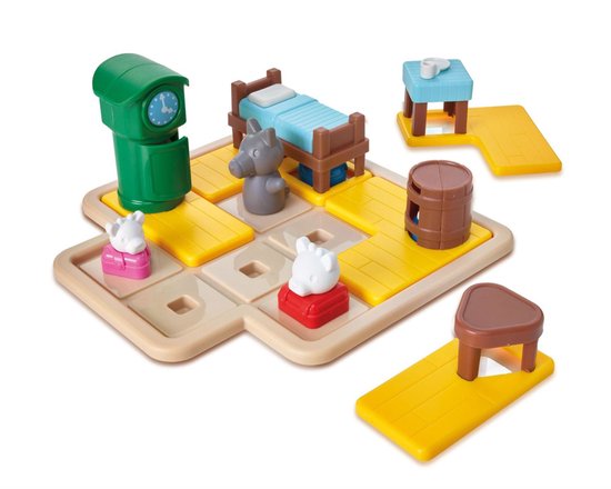Plateau de jeu avec loup, chevreaux, lit, tables et horloge.