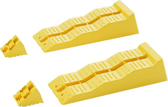 Set van gele oprijblokken, twee lange en twee korte exemplaren.