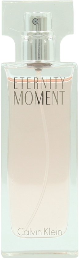 Flacon de Calvin Klein Eternity Moment Eau de Parfum au liquide rose pâle.