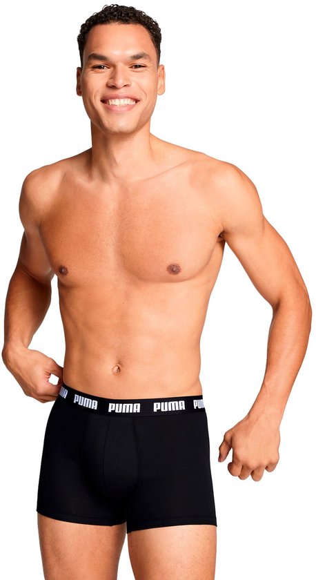 Zwarte Puma boxershorts met witte PUMA-band, model past ze aan