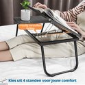 Laptoptafel met verstelbare helling, 4 standen, met een boek en plantje.