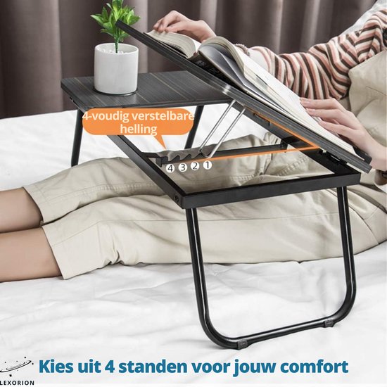 Laptoptafel met verstelbare helling, 4 standen, met een boek en plantje.