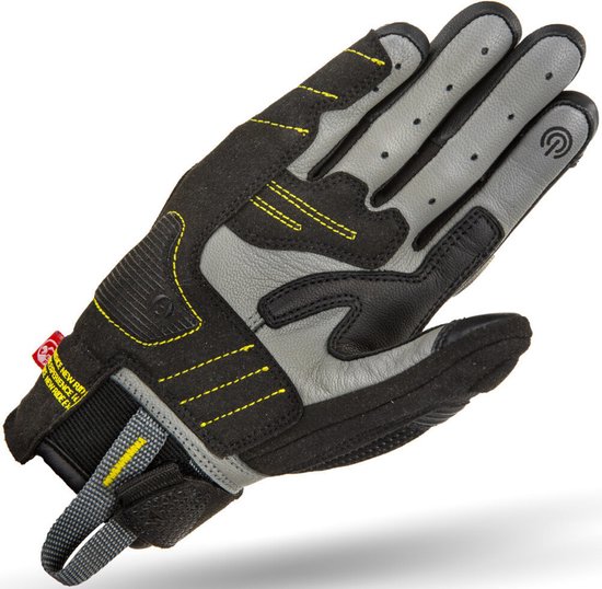 Zwarte en grijze SHIMA X-Breeze handschoen met gele stiksels, perforaties en grijze versterkingen.