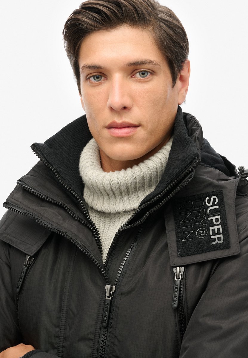 Solid Color Bomber Jacket with Zip Fastening and Four External Pockets Zwart