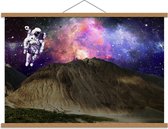 Schoolplaat – Astronaut boven Rotsen met Galaxy Lucht - 90x60cm Foto op Textielposter (Wanddecoratie op Schoolplaat)