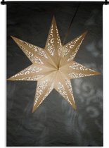 Wandkleed Kerst - Een verlichtte ster tijdens de winter Wandkleed katoen 60x90 cm - Wandtapijt met foto