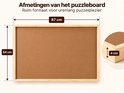Afmetingen van het houten puzzelbord: 87 cm breed, 64 cm hoog en 4 cm dik.