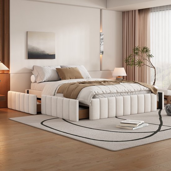 Beige gestoffeerd bed met opengewerkte lades, opgemaakt in een slaapkamer.