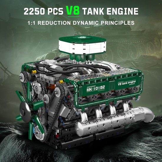 Gedetailleerd groen en zilver V8 tankmotor model op een rotsachtige ondergrond, met de verpakking ernaast.