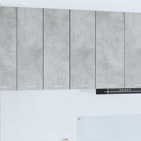 Wandkasten met betongrijze deuren en witte onderkasten, boven een afzuigkap.