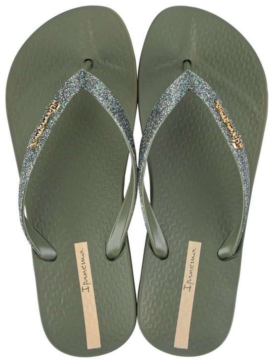 Lichtgroene Ipanema teenslippers met glitterbandjes en gouden logo.