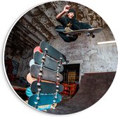 Forex Wandcirkel - Skater over Stapel Skateboarden - 20x20cm Foto op Wandcirkel (met ophangsysteem)