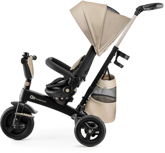 Zwarte driewieler met beige zonnekap, verstelbare duwstang en opbergmand.