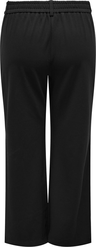 Een effen zwarte wijde broek van achteren gezien.