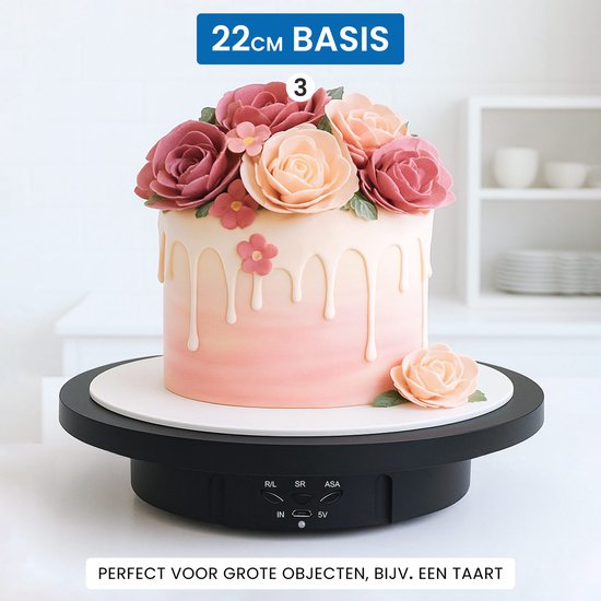 Zwart draaiplateau (22cm basis) met een roze en oranje taart met bloemen. Perfect voor grote objecten.
