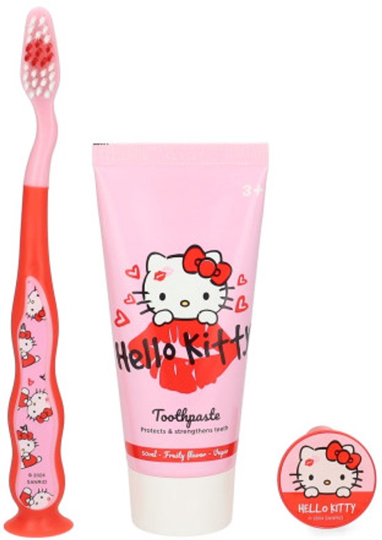 Hello Kitty tandenborstelset met tandpasta en kapje. Roze tandenborstel met Hello Kitty print, roze tandpastatube met Hello Kitty.