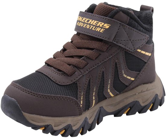 Bruine kinderschoen met klittenband, veters, zwarte mesh en gele strepen. Tekst 'WATERPROOF'.