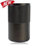 Donkere cilindrische diffuser met ribbelpatroon aan de bovenkant, met 'NEW'-label.