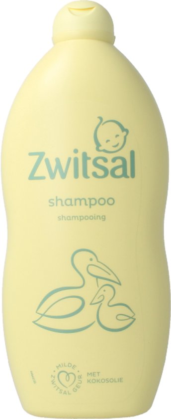 Een gele fles Zwitsal shampoo met een babyhoofdje, een pelikaan met kuiken en de tekst "Mild met kokosolie".