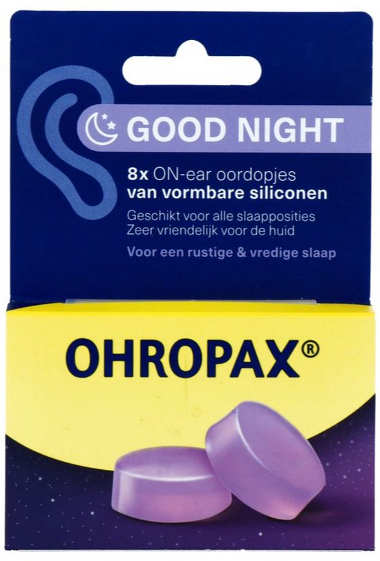 Verpakking met "GOOD NIGHT" en "OHROPAX". Twee paarse, ronde siliconen oordopjes.