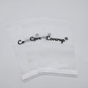 Trois sachets en plastique transparent avec le logo 'Coverup'.