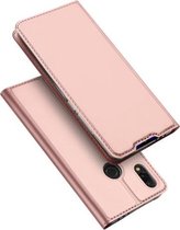 DUX DUCIS Skin Pro Series horizontale flip PU + TPU lederen hoes voor Xiaomi Redmi 7, met houder en kaartsleuven (roségoud)