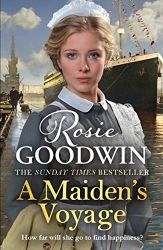 Vrouw in dienstmeisjeskostuum met wit kapje voor een historisch schip. Boektitel: A Maiden's Voyage door Rosie Goodwin.