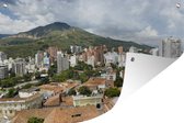 Muurdecoratie Stad voor een gebergte in Colombia - 180x120 cm - Tuinposter - Tuindoek - Buitenposter