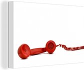 Canvas Schilderij De hoorn van een rode retro telefoon - 90x60 cm - Wanddecoratie